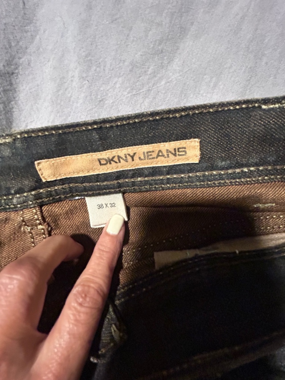 DKNY Black Denim Jeans with White Topstitching and Brown Button